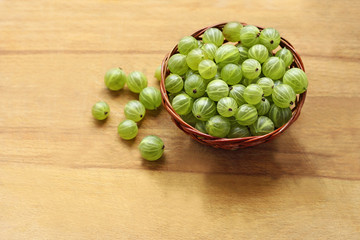 Gooseberries in the wicker basket.