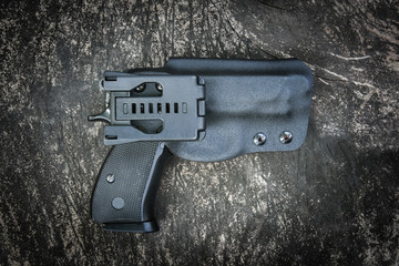 handgun in holster