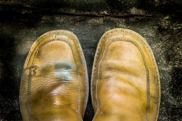 Close-up of grungy leather shoes