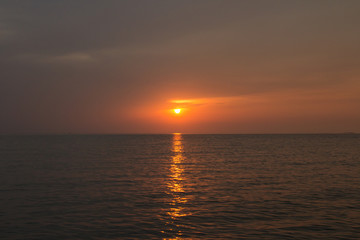 Naklejka na ściany i meble The beautiful sunset view from Thai bay.