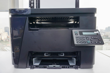 close up multi function printer for business documents printing and scanning in office