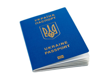 Fototapeta premium New ukrainian blue international biometric passport with identification chip and fingerprints isolated on white. Selective focus