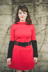 young beautiful red dressed vintage hipster woman