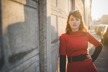 young beautiful red dressed vintage hipster woman