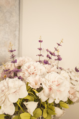 handmade bouquet of veils and beads in white on a white concrete background. Wedding card. White wedding background.