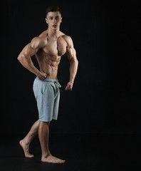 Portrait of handsome body builder
