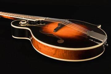 Mandolin on black background