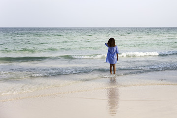 Young woman in ocean