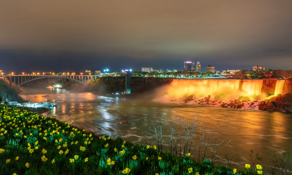 The Rainbow Bridge and Niagara Falls as seen from Canada