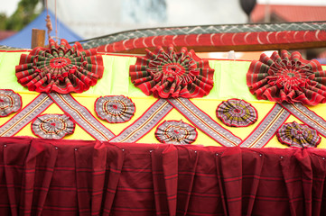 Traditional Thai Loincloths decorated on the car in the Rocket Festival parade show.