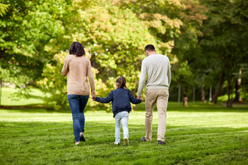 Fototapeta premium happy family walking in summer park