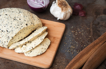Homemade Organic Cheese with with herbs basil