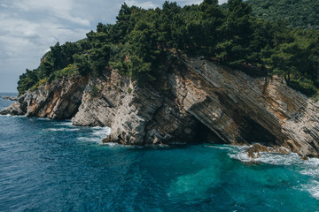 Rocks on the sea in Montenegro.  Wild beach and Dangerous coast.