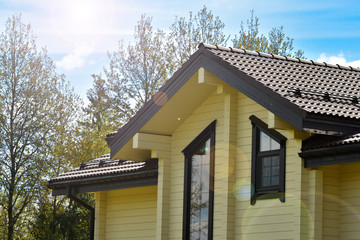 The facade of the wooden house in modern style