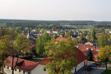 Fototapeta premium Aerial view over the center of Cesis old town of the Western Tower of the Cesis Castle. View on old street in Cesis city. Latvia, Europe. 