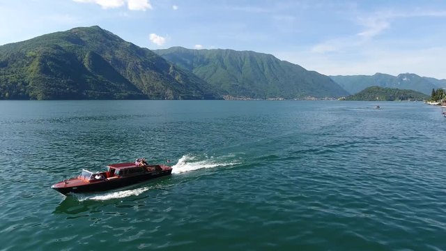 Speedboat on the lake - Passengers on the boat - Lake of Como