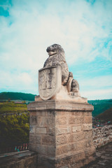 Obraz premium Veliko Tarnovo city, old capital of Bulgaria, Europe. Spring season. Lion sculpture at the castle Tsarevets Castle entrance.
