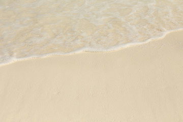 Fototapeta na wymiar background of wave on a sand