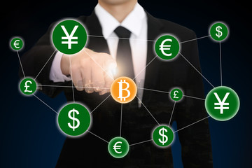 businessman hand point to bitcoin currency