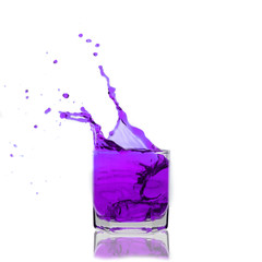 violet cocktail splashing on a glass on white background