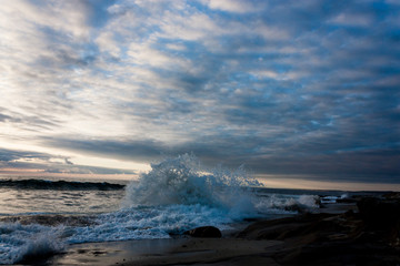 sunset over the sea waves crashing in la jolla