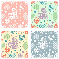 Foto op Canvas Set of seamless vector patterns with hearts. Background with hand drawn ornamental symbols. Template for wrapping, decor, surface, cards, backgrounds, textile, print. Decorative repeat ornament. © Valentain Jevee