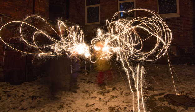 Writing with sparklers.
