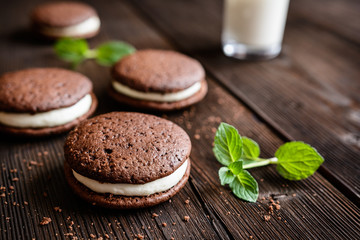 Traditional chocolate Whoopie pies filled with cream