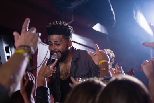 Singer performing on stage