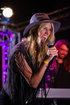 Singer performing on stage