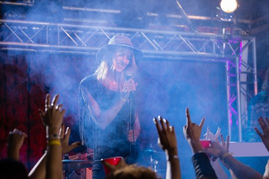Singer performing on stage