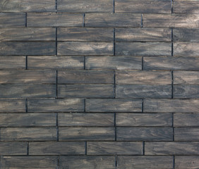 Black, rustic, rough wooden slats, dark abstract background of hard wood