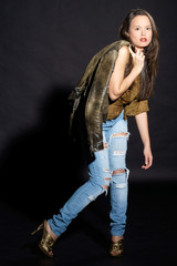 fashion style photo of young beautiful and sexy woman posing in casual clothes in studio