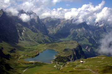 Fototapeta premium Stunning view of the lake Truebsee and the mountain range of the Uri Alps with Mount Titlis, Switzerland