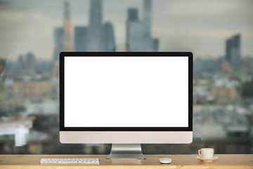 Fototapeta premium Hipster desktop with empty white computer