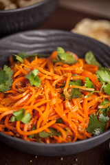 Asian korean carrot salad with spices in the ?lay plate