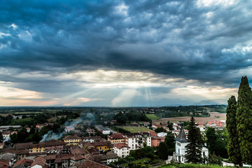 Evening storm over the medieval village