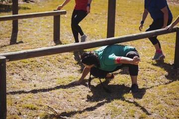 Fit women training on fitness trail in the boot camp