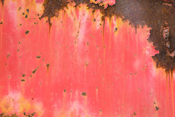 red withered paint on rusty metal grunge texture