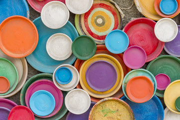 Colorful clay plates. Wall decoration.
