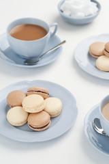 Chocolate and Vanilla Macarons with Hot Tea