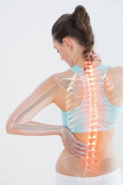 Digitally generated image of female suffering from muscle pain