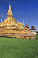 Fototapeta na wymiar SE.corner-first level wall of PhaThat Luang gold-covered stupa. Vientiane-Laos. 4857