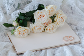 bouquet of white roses and lace