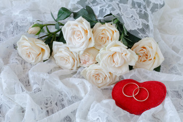 bouquet of white roses and lace