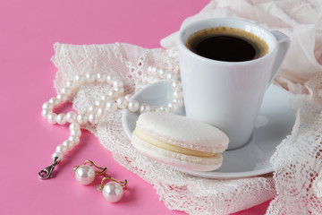 Morning brearfast on table with bijouterie and coffee cup