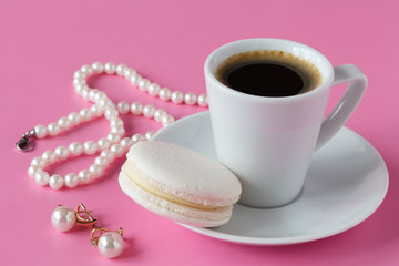 Morning breakfast for her French macaroon and coffee