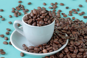 Coffee beans in coffee cup