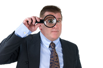 Fototapeta na wymiar Man with magnifying glass