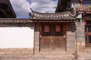 Ancient old retro old Naxi house street view of Baisha Ancient Town in Lijiang, Yunnan Province, China